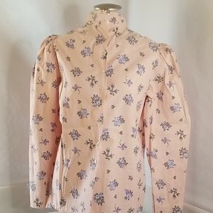 Pink blouse with blue flowers